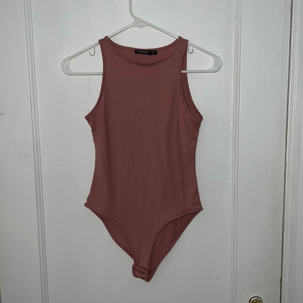 Pink sleeveless body suit